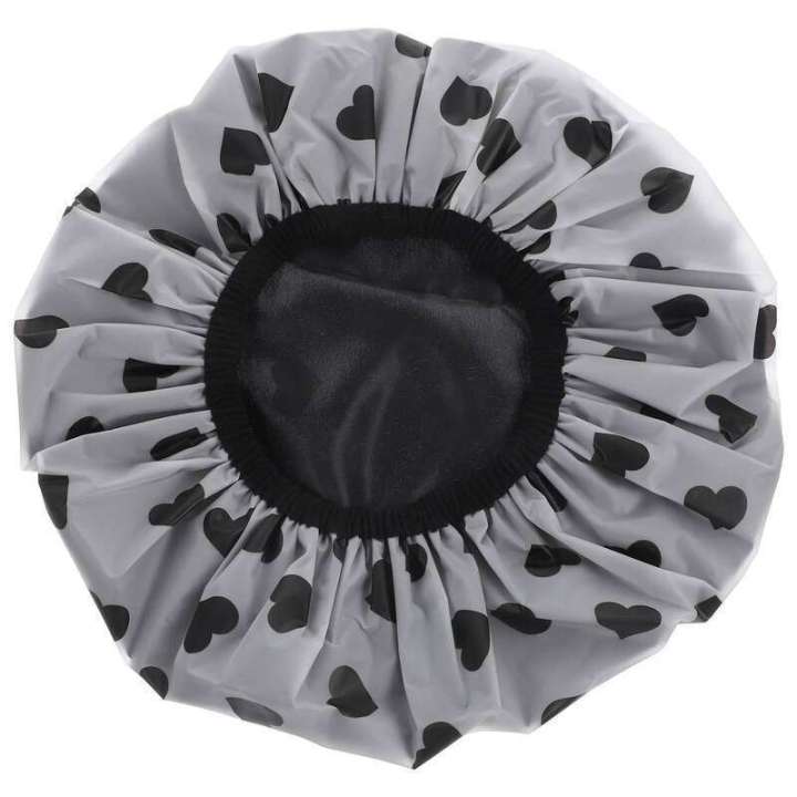 Shower cap showing black satin lining